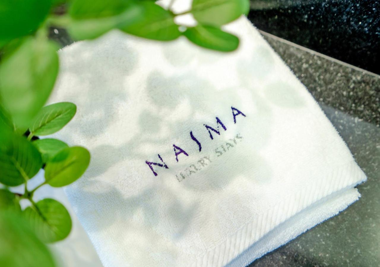 Nasma Luxury Stays - Cayan Tower دبي المظهر الخارجي الصورة